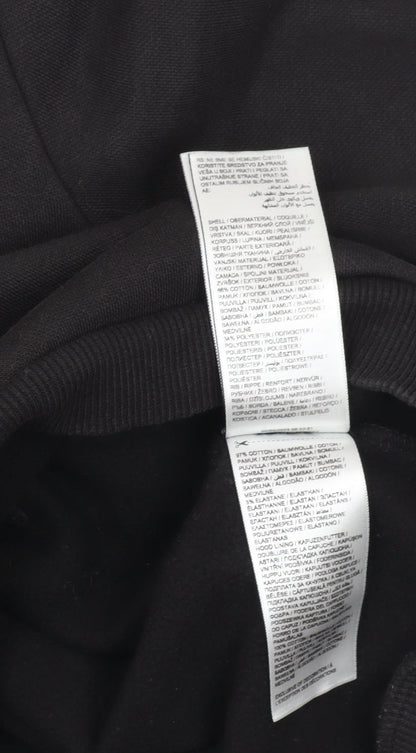 Brand and care label for Puma boys’ black pullover hoodie 7-8 years