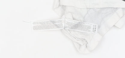 Close-up detail of Disney at Primark girls’ white stitch t-shirt 3-4 years