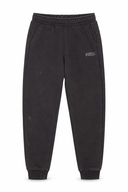 Front view of Puma boys’ black jogger trousers, size 7-8, years