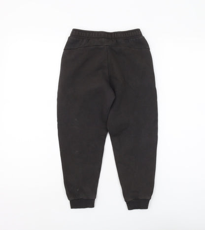 Back view of Puma boys’ black jogger trousers, size 7-8, years