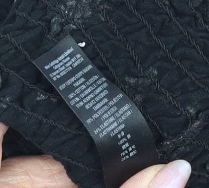 Brand and care label for Miss Selfridge Women's Black Floral Tunic Blouse, size 8