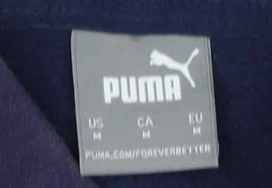 Close-up detail of Puma Men's Purple Hoodie M Pullover Fleece Logo