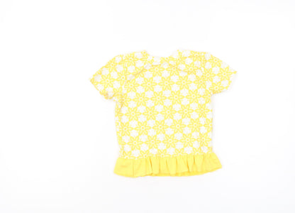Back view of Disney Frozen girls’ yellow rash guard 5-6 years floral