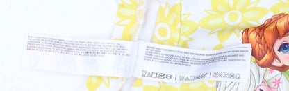 Close-up detail of Disney Frozen girls’ yellow rash guard 5-6 years floral