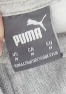 Close-up detail of Puma Men's Grey Pullover Sweatshirt M