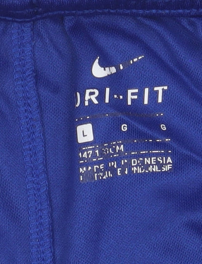 Close-up detail of Nike boys’ blue athletic football shorts, size L