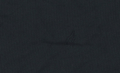 Brand and care label for Sondico boys’ black athletic shorts 13 years