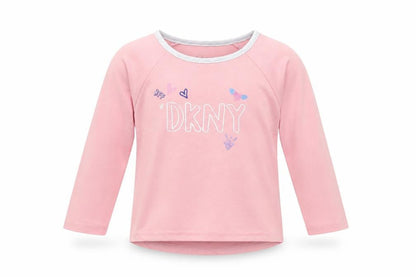 Front view of DKNY girls’ pink long sleeve t-shirt, size 5, pullover style
