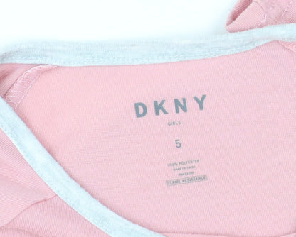 Close-up detail of DKNY girls’ pink long sleeve t-shirt, size 5, pullover style