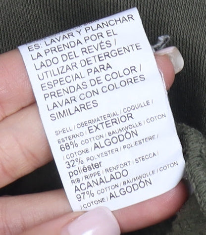 Brand and care label for Puma Men's Green Pullover Hoodie Medium