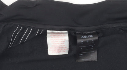 Brand and care label for Adidas boys’ black track jacket 7-8 years