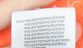 Close-up detail of Sondico boys’ orange t-shirt, size 3-4, years, sports style