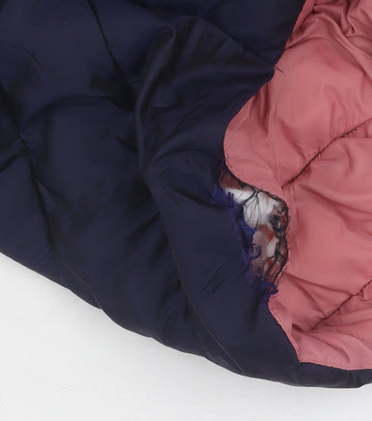 Brand and care label for Marks & Spencer girls’ blue puffer jacket, size 8-9, years