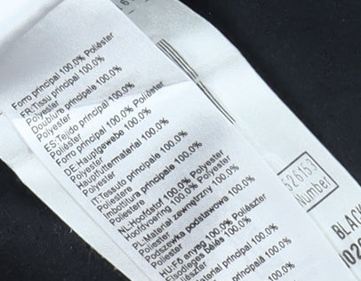 Close-up detail of Decathlon girls’ black fleece jacket, size 12, lightweight activewear