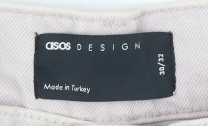 Close-up detail of ASOS DESIGN Men's Beige Jeans, size 30, Button Pockets