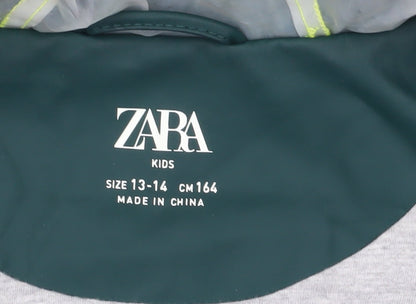 Close-up detail of Zara girls’ green basic jacket 13-14 years collared