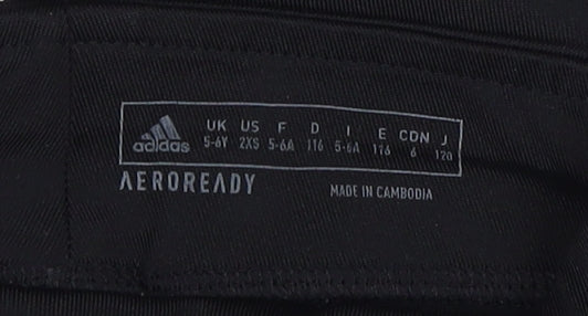 Close-up detail of Adidas girls’ black leggings -, size 5-6, years, activewear
