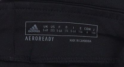 Close-up detail of Adidas girls’ black leggings -, size 5-6, years, activewear