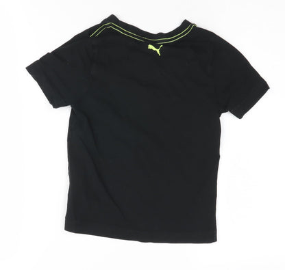 Back view of Puma boys’ black graphic t-shirt 5-6 years, logo accent