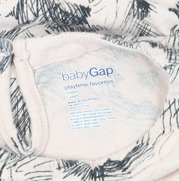Close-up detail of Gap girls’ ivory floral t-shirt, 5 years, long sleeve