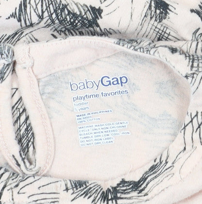 Close-up detail of Gap girls’ ivory floral t-shirt, 5 years, long sleeve