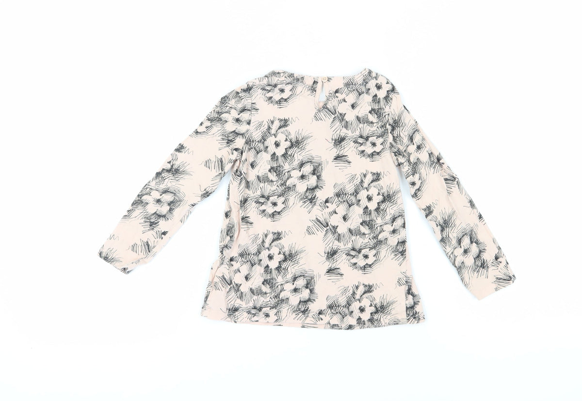 Brand and care label for Gap girls’ ivory floral t-shirt, 5 years, long sleeve