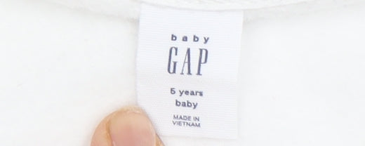 Close-up detail of Gap girls’ full zip white hoodie with rainbow logo, size 5
