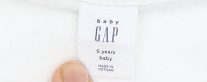 Close-up detail of Gap girls’ full zip white hoodie with rainbow logo, size 5