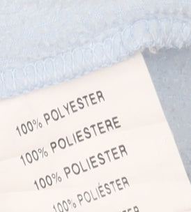Close-up detail of Snow+Rock girls’' blue fleece pullover - 10 years, zip neck