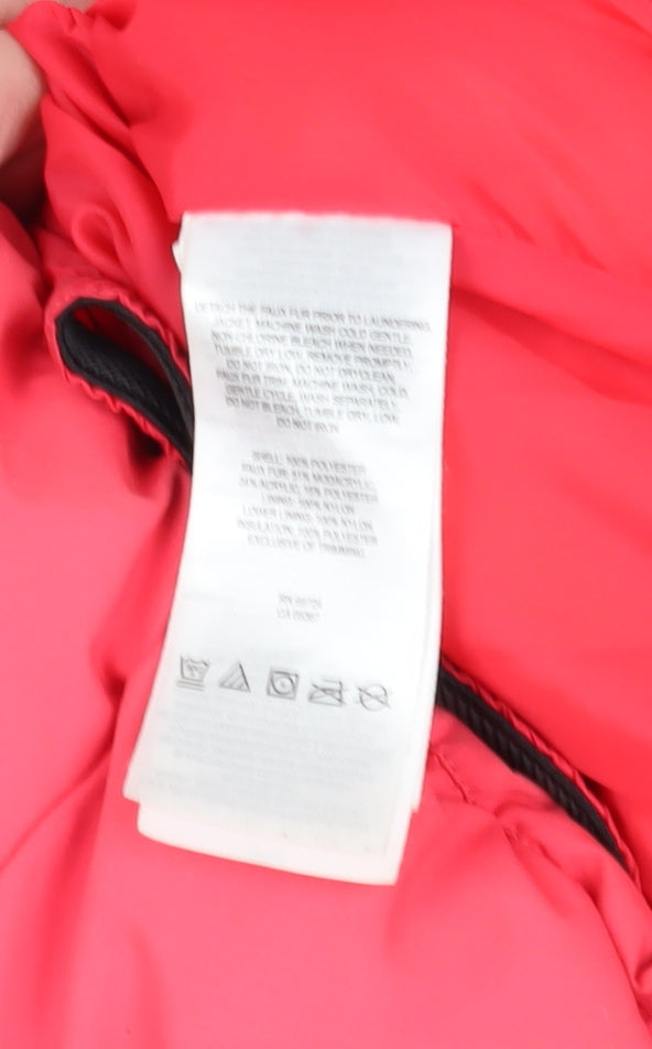 Brand and care label for Columbia girls’ pink puffer jacket s winter hooded
