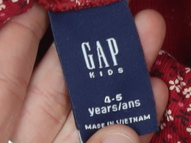 Close-up detail of Gap girls’ red floral roll neck pullover t-shirt 4-5 years