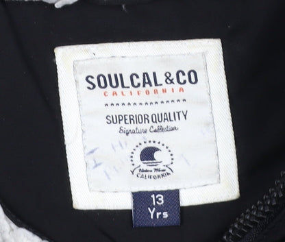 Brand and care label for SoulCal boys’ black puffer jacket 13 years