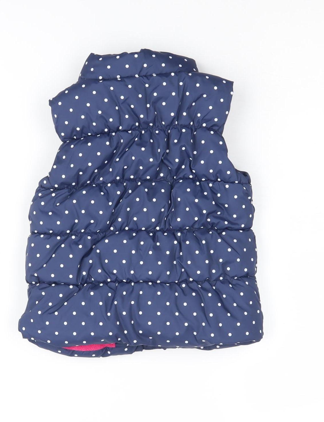 Back view of Baby Gap girls’ blue polka dot puffer jacket 2 years