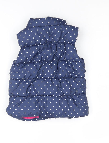 Back view of Baby Gap girls’ blue polka dot puffer jacket 2 years