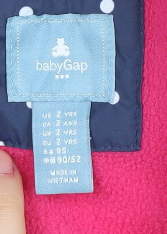 Brand and care label for Baby Gap girls’ blue polka dot puffer jacket 2 years