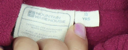 Close-up detail of Mountain Warehouse girls’ red fleece pullover 15-16 years