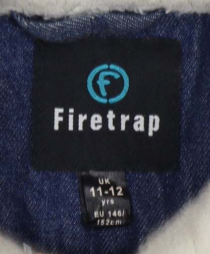 Close-up detail of Firetrap girls’ blue denim jacket, size 11-12, lined casual