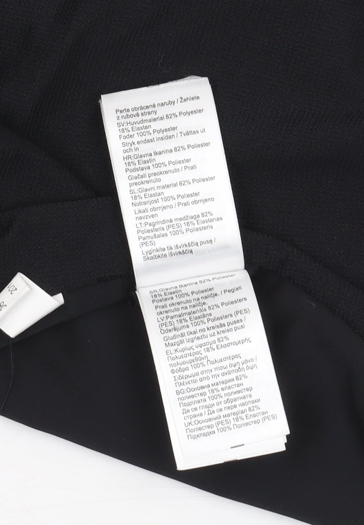 Close-up detail of Decathlon girls’ black one piece swimsuit, size 12