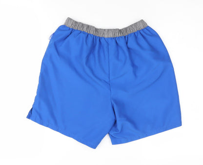 Back view of Trespass boys’ blue swim shorts, size 11, lightweight, elastic waist