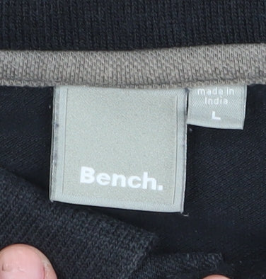 Close-up detail of Bench Black polo Shirt, size L