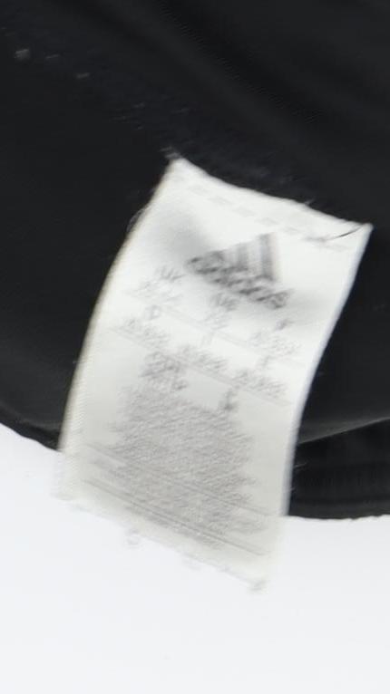 Close-up detail of Adidas Women's Black Leggings M Elastic Waist Gym