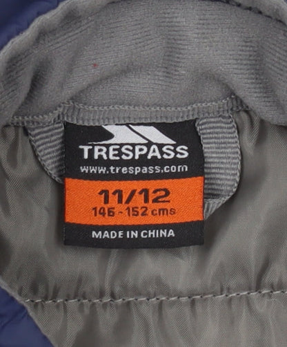 Close-up detail of Trespass boys’ blue puffer jacket 11-12 years winter coat