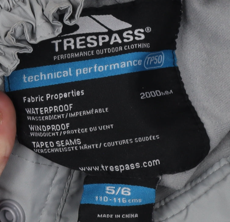 Close-up detail of Trespass boys’' grey snow pants, size 5, waterproof winter trousers