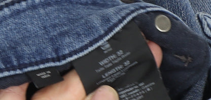 Brand and care label for G-Star RAW Men's Blue Skinny Jeans, size 32