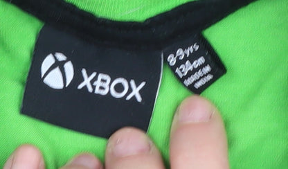 Brand and care label for Xbox boys’ green graphic long sleeve t-shirt 8-9 years