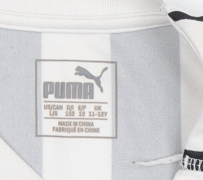 Close-up detail of Puma boys’ black & white striped football jersey 12-13y