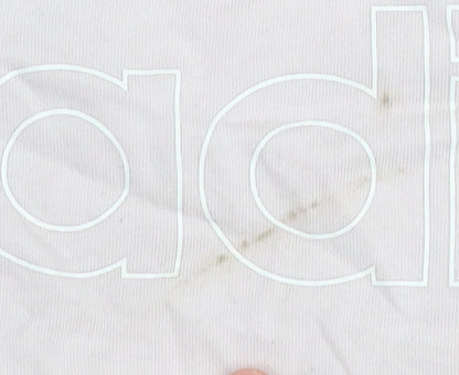 Close-up detail of Adidas girls’ pink t-shirt 11-12 years basic logo tee