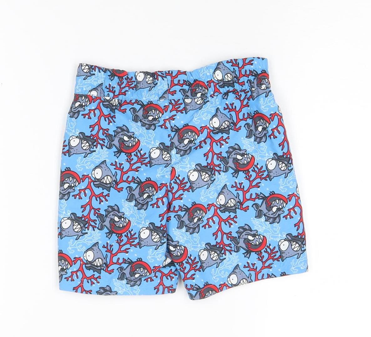 Back view of Zoggs boys’ blue fish print swim shorts 2 years quick dry