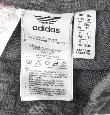 Close-up detail of Adidas boys’ grey camouflage athletic shorts 2-3 years