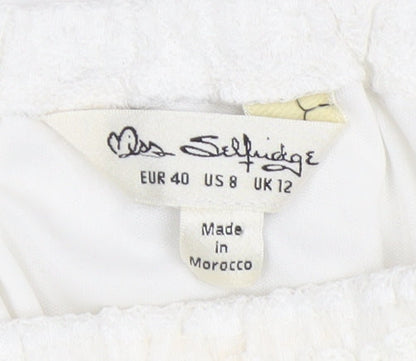 Close-up detail of Miss Selfridge White Lace Off Shoulder Blouse, size 12